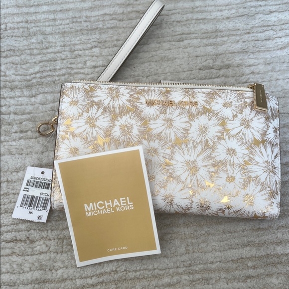 Michael Kors Gold and White Floral Wristlet - Picture 2 of 10